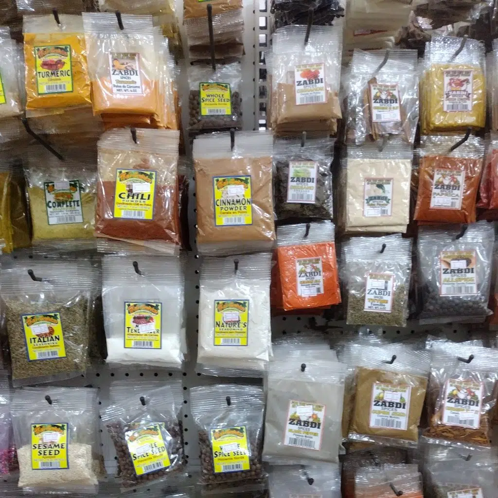 Vacation Rental Meal Planning Small Packets of Spices in Belize Grocery Store